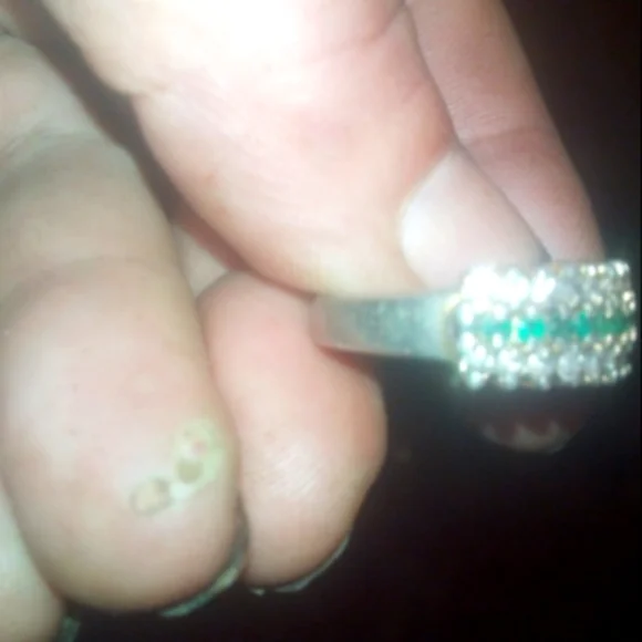 Genuine emerald and F diamond gold and silver ring